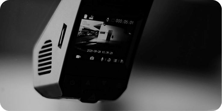 Vehicle dashcam recording footage with screen display